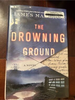 The Drowning Ground - Blue Hardcover Novel